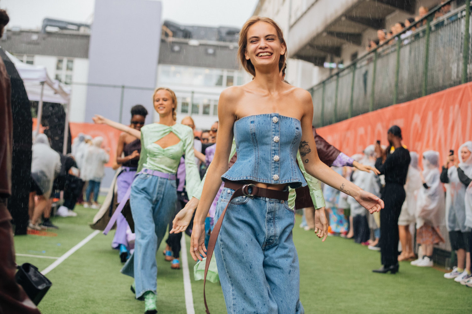 model at the ganni show smiling