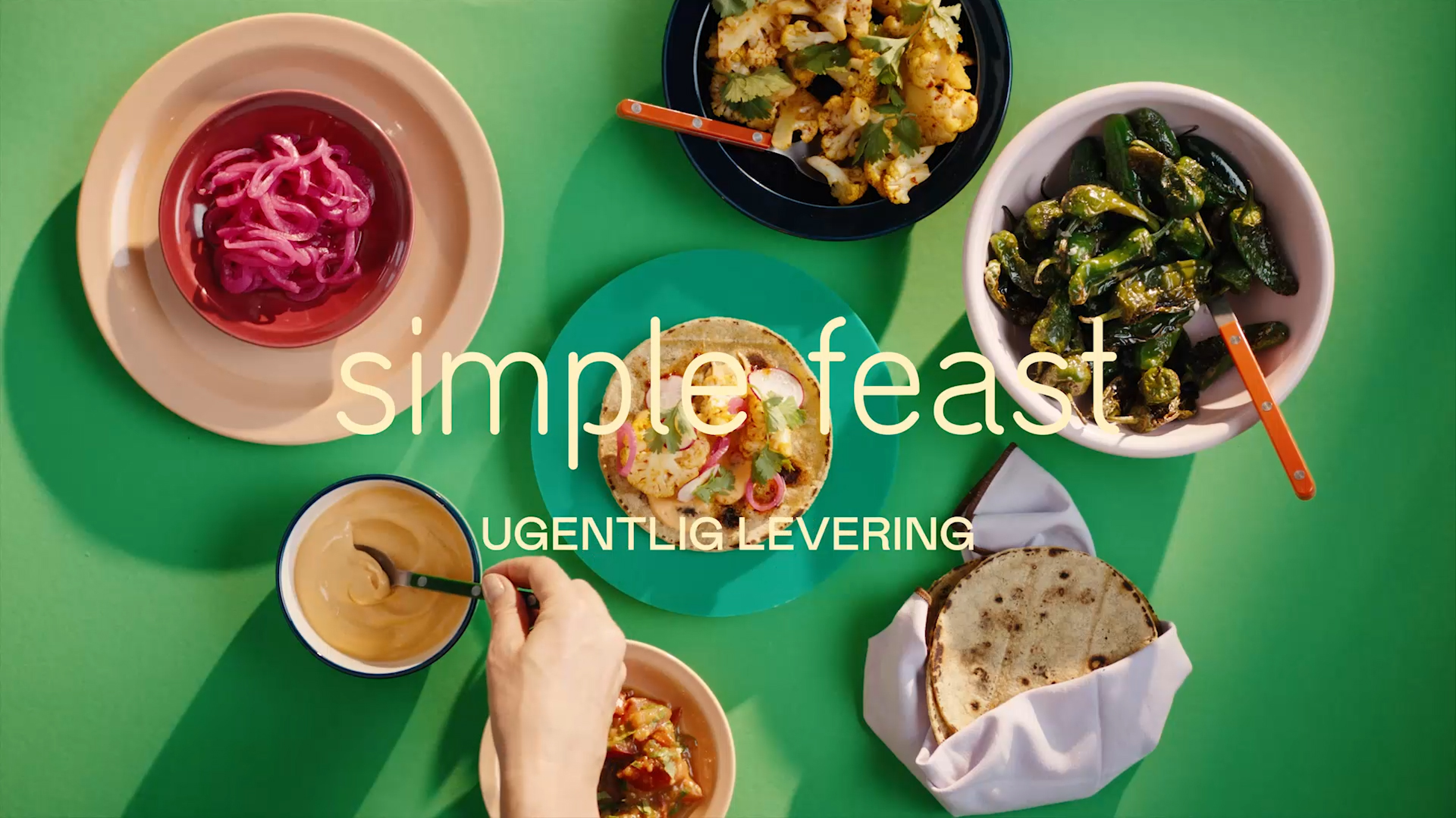 Green table with different types of meals