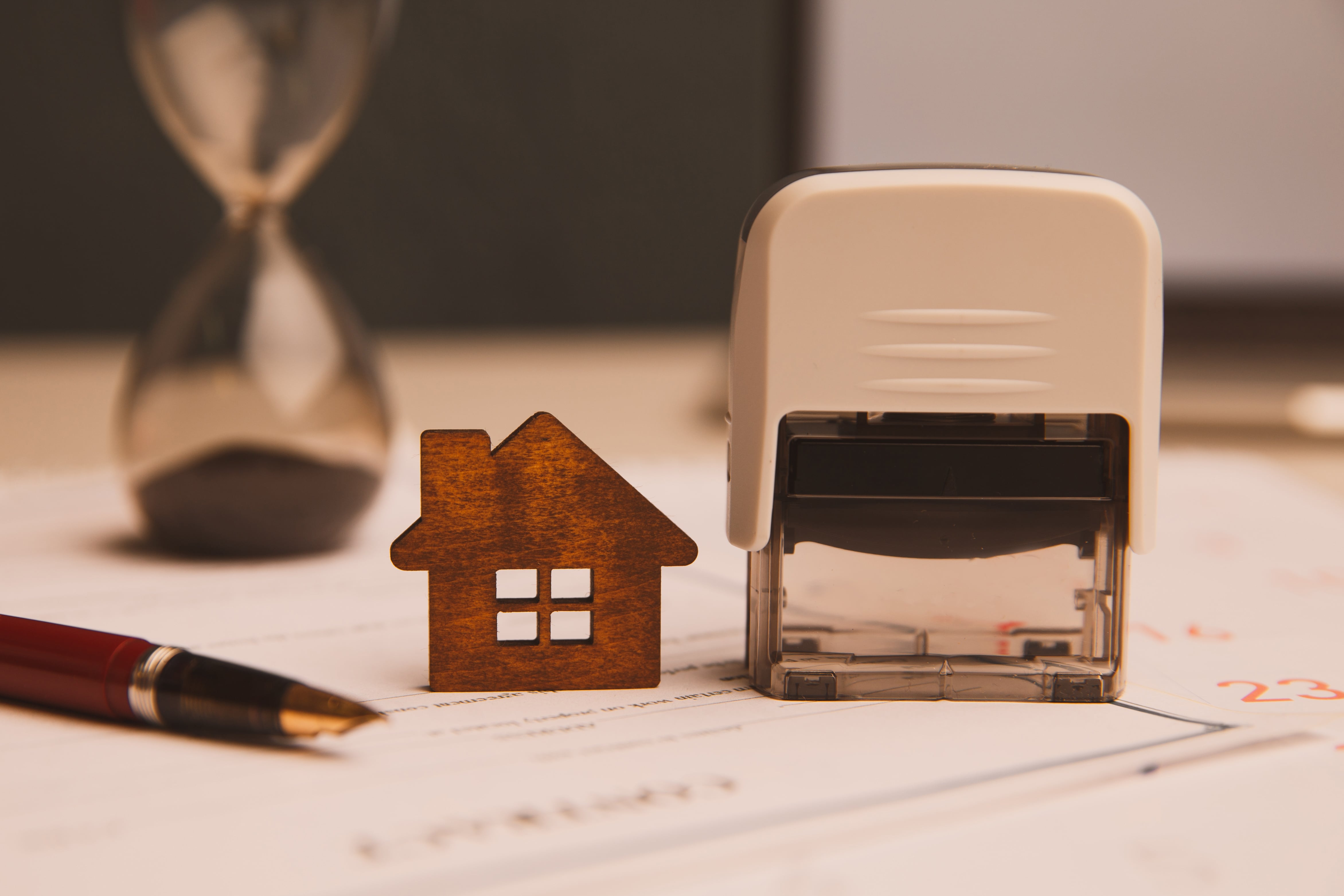 Small wooden house figurine.