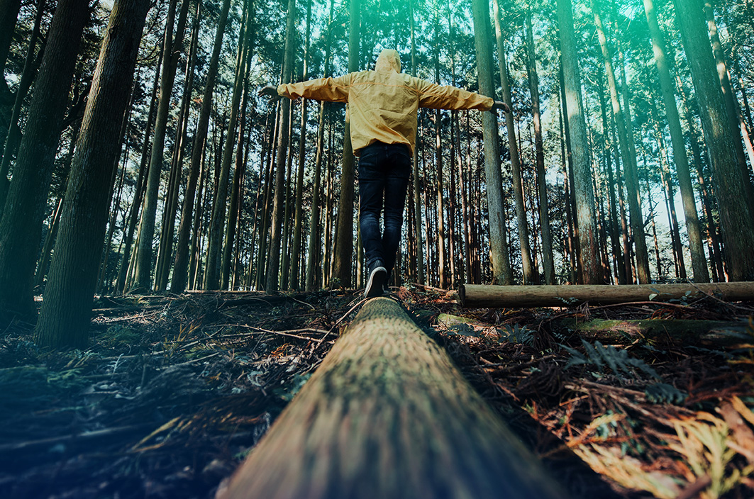 traveler man discovering new places in the wild nature
