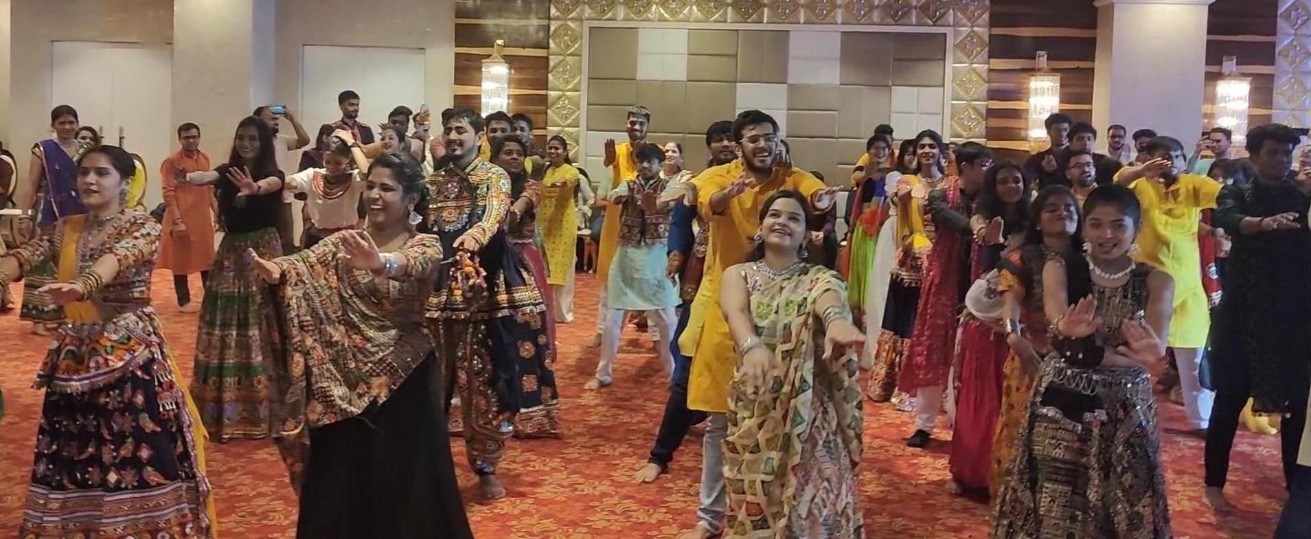 Indian people dancing in colorful clothes