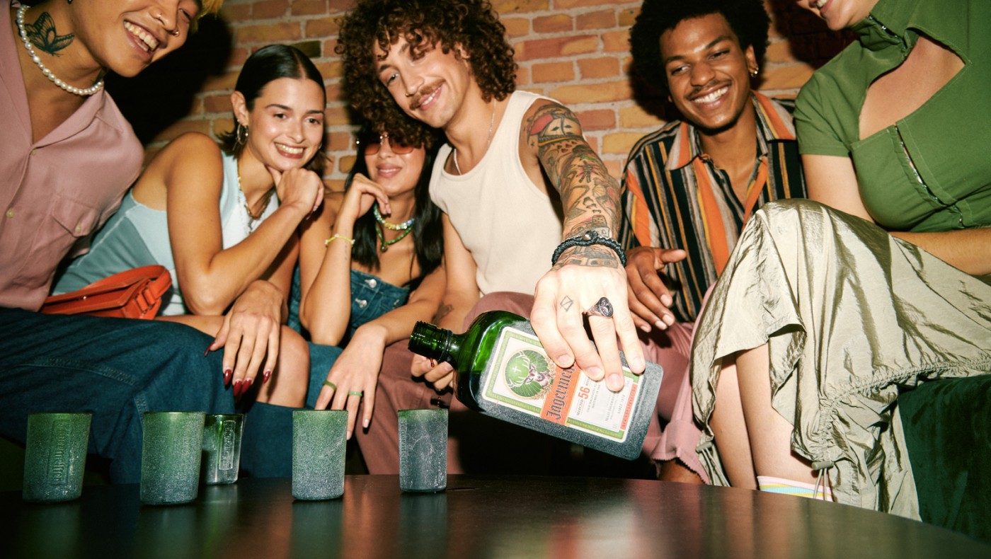 Group of people doing shots with Jägermeister