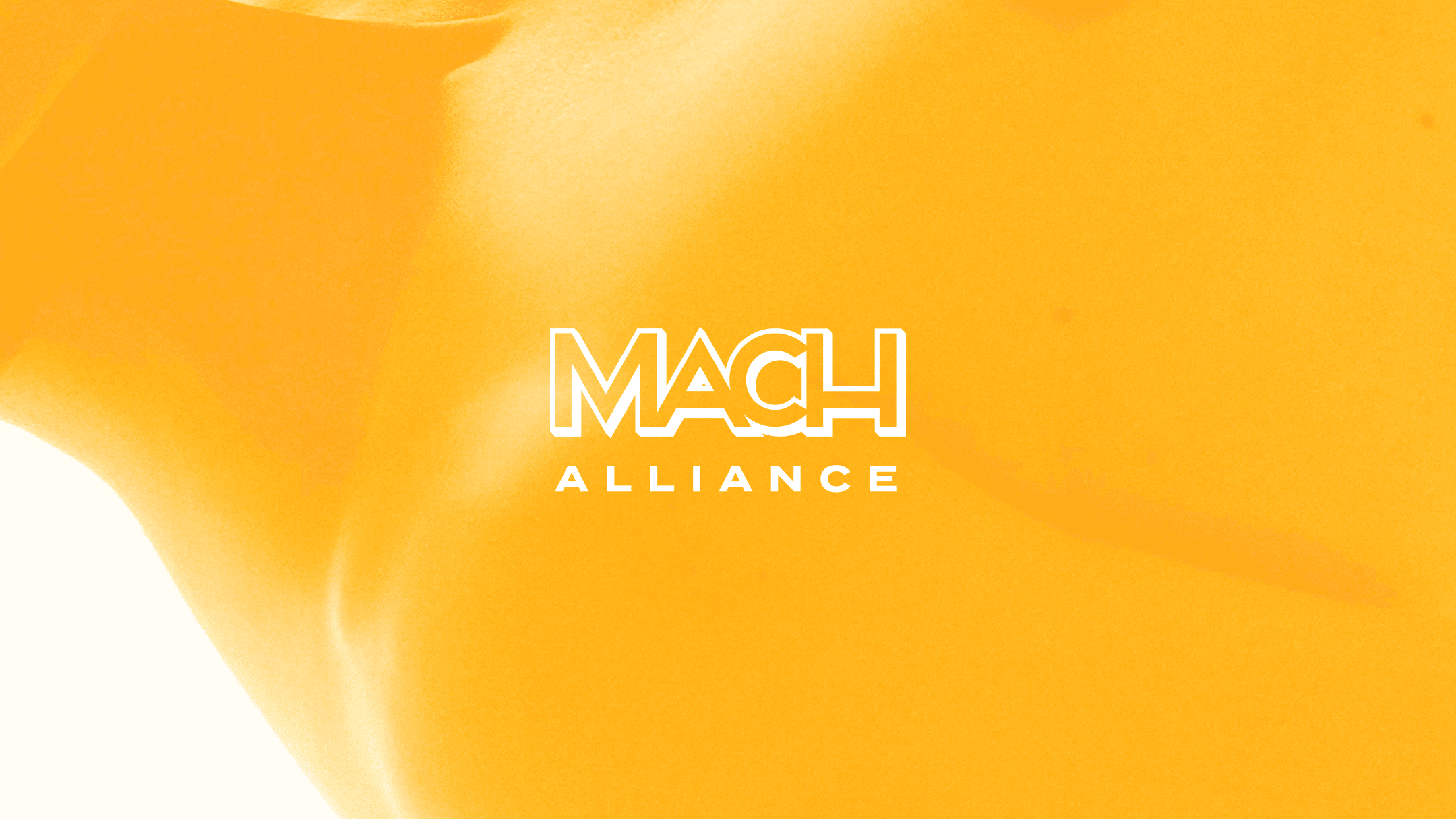 White Mach Alliance logo on a yellow background