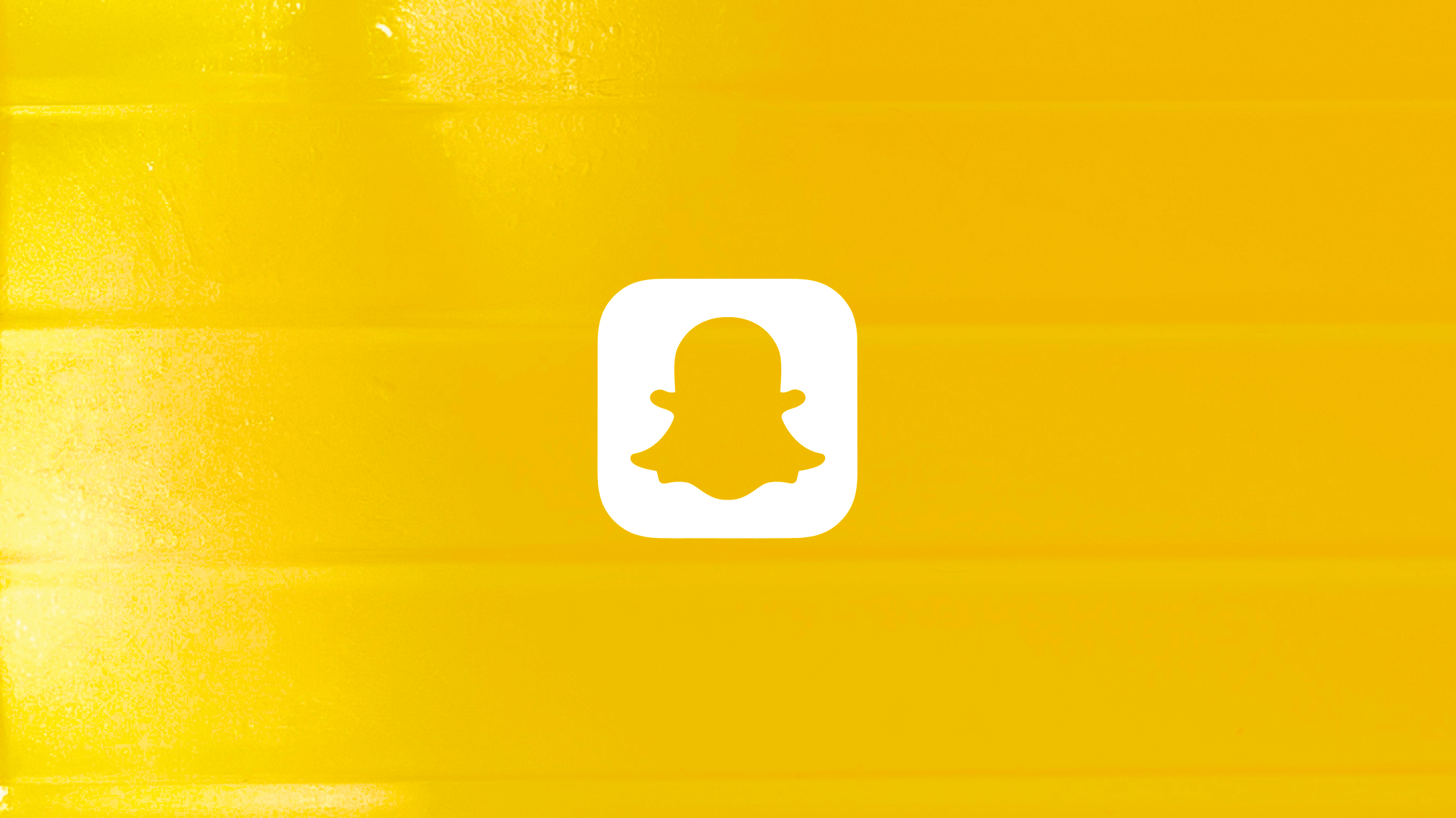Snapchat logo on yellow background.