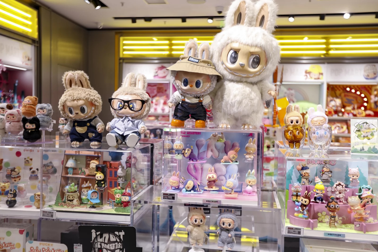 Display of collectible Labubu figures in various costumes